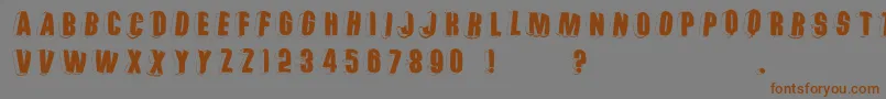 Threedimrightwardsround-Schriftart – Braune Schriften auf grauem Hintergrund