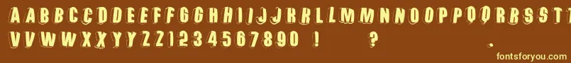 Threedimrightwardsround-fontti – keltaiset fontit ruskealla taustalla