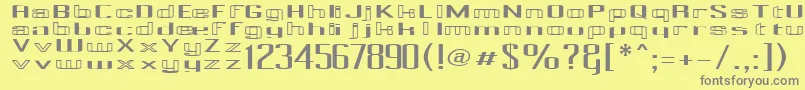 フォントPecotCombined – 黄色の背景に灰色の文字