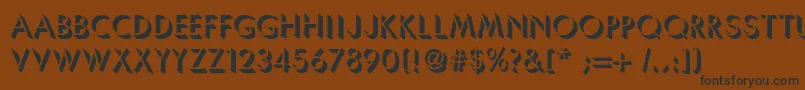Umbrellac Font – Black Fonts on Brown Background