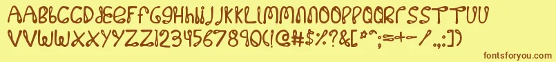 フォント32768no – 茶色の文字が黄色の背景にあります。