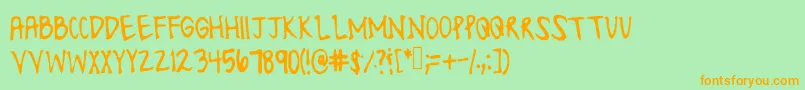 フォントLonesomefont – オレンジの文字が緑の背景にあります。