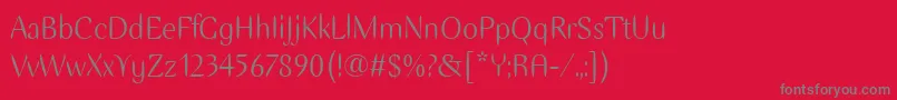 フォントEllipseItc – 赤い背景に灰色の文字