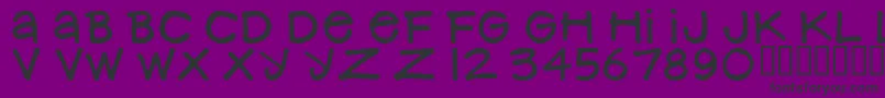 フォントNancynayWide – 紫の背景に黒い文字
