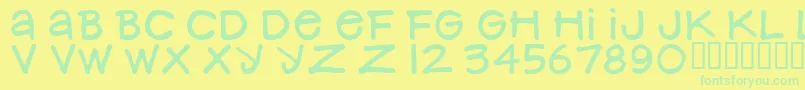 NancynayWide Font – Green Fonts on Yellow Background