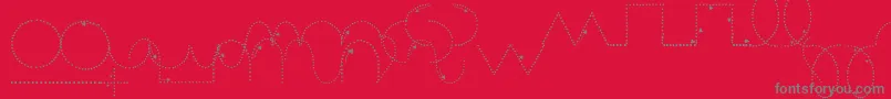 Fonte Maternellecolor – fontes cinzas em um fundo vermelho