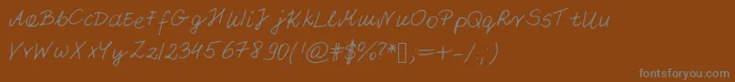 フォントPattifont – 茶色の背景に灰色の文字