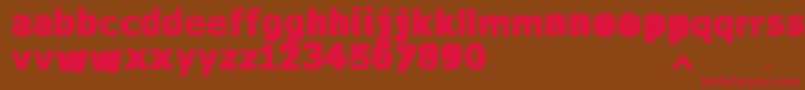 フォントVtksWaterCristals – 赤い文字が茶色の背景にあります。