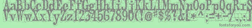 Puzzleface-Schriftart – Graue Schriften auf grünem Hintergrund