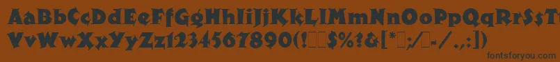 フォントXyloLetPlain.1.0 – 黒い文字が茶色の背景にあります