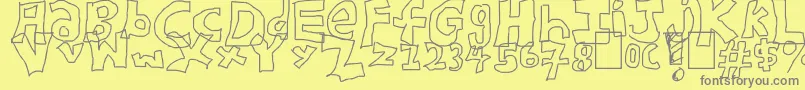 Blockster-fontti – harmaat kirjasimet keltaisella taustalla