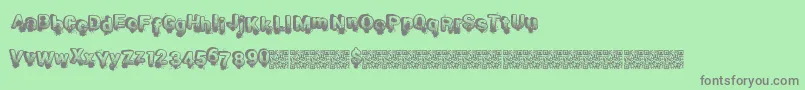 Smashbreak Font – Gray Fonts on Green Background