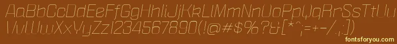 PoliticaXtLightItalic-fontti – keltaiset fontit ruskealla taustalla