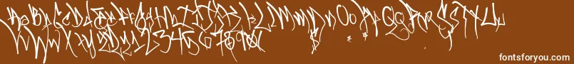 Czcionka Blackbookone – białe czcionki na brązowym tle
