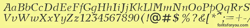 NewjournalcttItalic Font – Black Fonts on Yellow Background