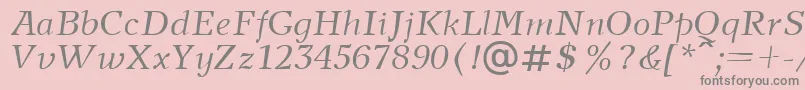 NewjournalcttItalic-fontti – harmaat kirjasimet vaaleanpunaisella taustalla