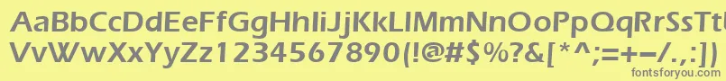 Everestdemi-fontti – harmaat kirjasimet keltaisella taustalla