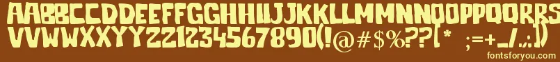 Jelek-fontti – keltaiset fontit ruskealla taustalla