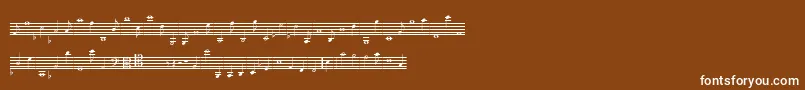 フォントLassusMedium – 茶色の背景に白い文字