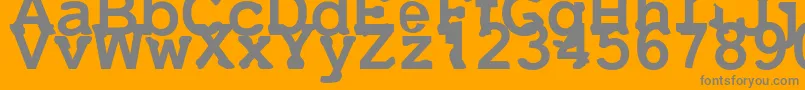 Uneek Font – Gray Fonts on Orange Background