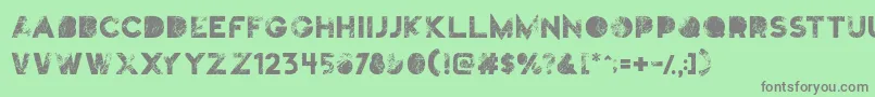 Truskey Font – Gray Fonts on Green Background