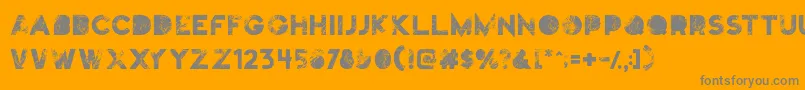 フォントTruskey – オレンジの背景に灰色の文字