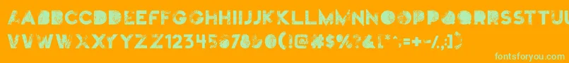Truskey Font – Green Fonts on Orange Background
