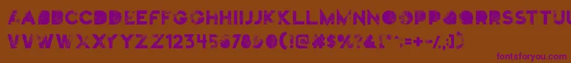 Czcionka Truskey – fioletowe czcionki na brązowym tle