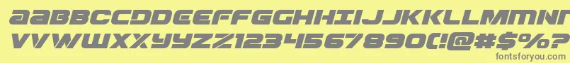 Ozdaexpandital Font – Gray Fonts on Yellow Background