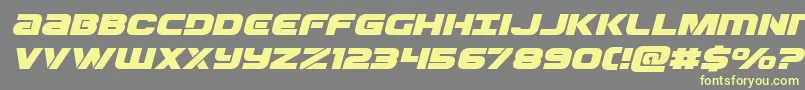 Ozdaexpandital-Schriftart – Gelbe Schriften auf grauem Hintergrund