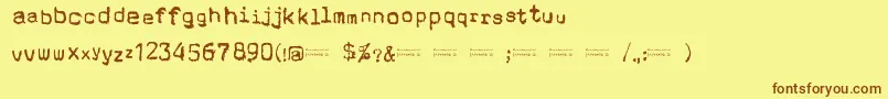 フォントCholoSperryRandR20 – 茶色の文字が黄色の背景にあります。