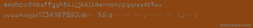 CholoSperryRandR20-fontti – harmaat kirjasimet ruskealla taustalla