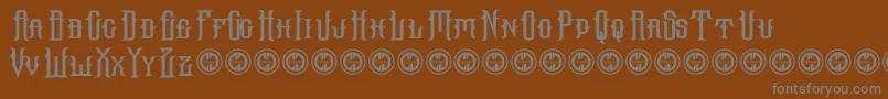 Hallowgrave-fontti – harmaat kirjasimet ruskealla taustalla