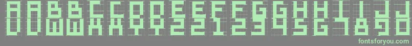 フォントSketchiquad – 灰色の背景に緑のフォント