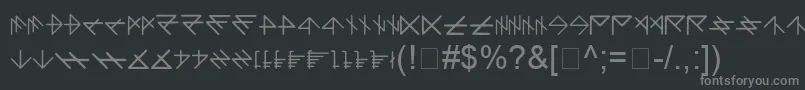 フォントDliDarkscript – 黒い背景に灰色の文字