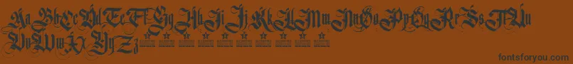 GermanikaPersonalUse Font – Black Fonts on Brown Background