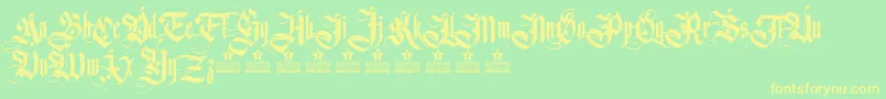フォントGermanikaPersonalUse – 黄色の文字が緑の背景にあります
