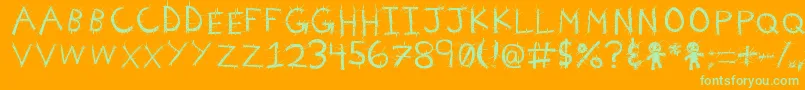 VoodooNeedles Font – Green Fonts on Orange Background