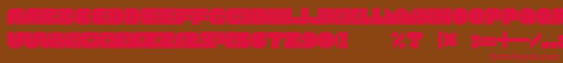 フォントRotorblockChamfer – 赤い文字が茶色の背景にあります。
