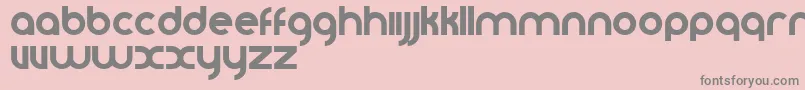 Vomzom-fontti – harmaat kirjasimet vaaleanpunaisella taustalla
