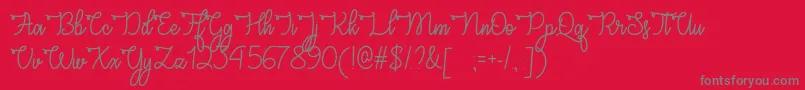 CongratsScriptOtf-Schriftart – Graue Schriften auf rotem Hintergrund