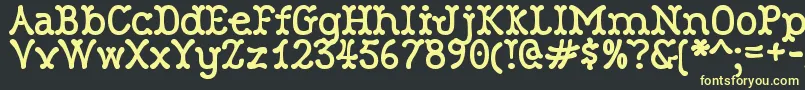 RobinneTruecase Font – Yellow Fonts on Black Background