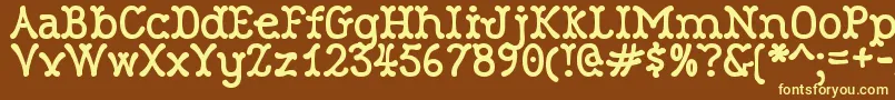 Saiba mais sobre a fonte RobinneTruecase Fonte RobinneTruecase – fontes amarelas em um fundo marrom