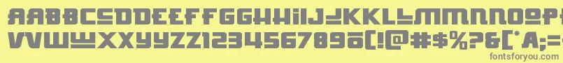 Hongkonghustleexpand-fontti – harmaat kirjasimet keltaisella taustalla