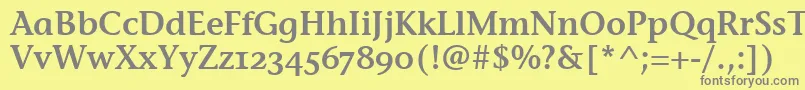 StoneInfSemOsItcTtSemi-fontti – harmaat kirjasimet keltaisella taustalla
