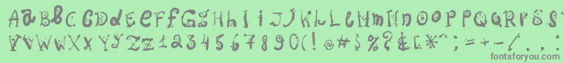 フォントOspac – 緑の背景に灰色の文字