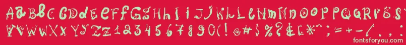 フォントOspac – 赤い背景に緑の文字