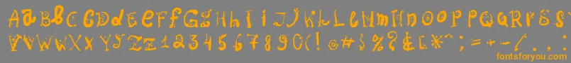 フォントOspac – オレンジの文字は灰色の背景にあります。