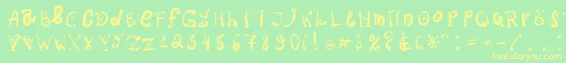 フォントOspac – 黄色の文字が緑の背景にあります