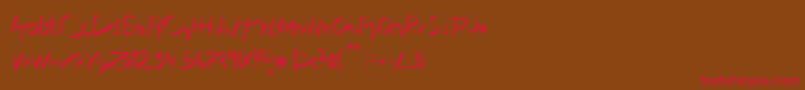 フォントXaligraphyThin – 赤い文字が茶色の背景にあります。